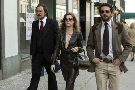 Christian Bale, Amy Adams, and Bradley Cooper in 'American Hustle'
